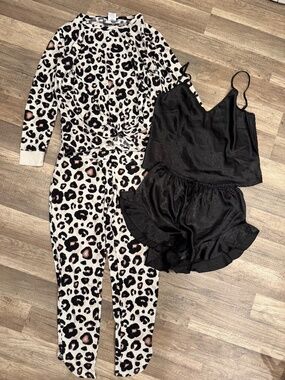 Lot of two size medium pajama sets.